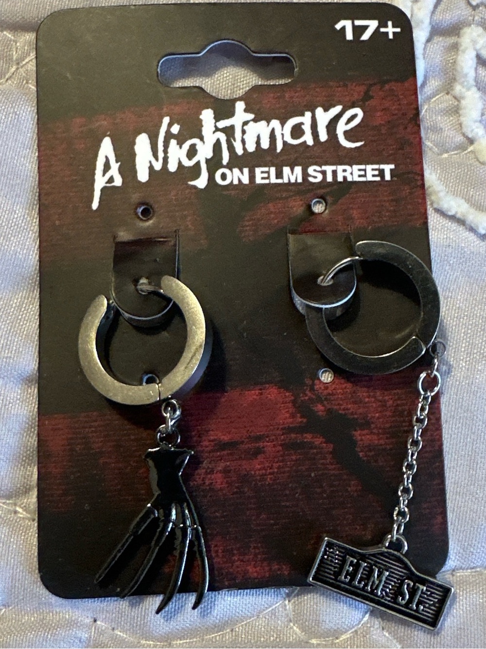Spencer's Black Asymmetrical Nightmare Dangle Earrings